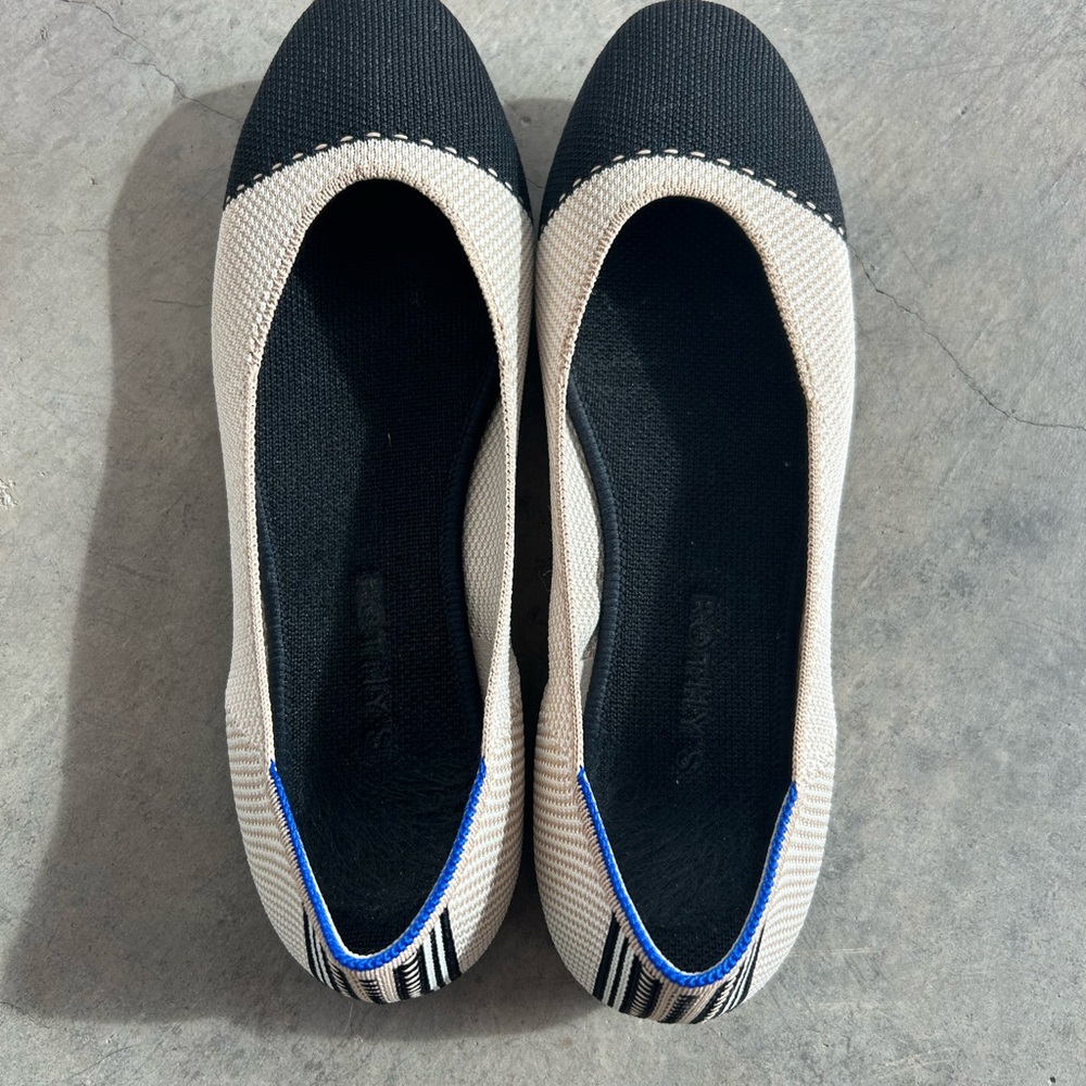 Rothy's Black and Cream Flats with Blue Accent